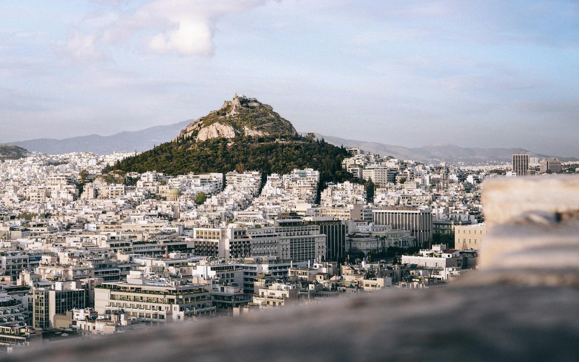 Rooftop view of Athens cityscape with the Acropolis