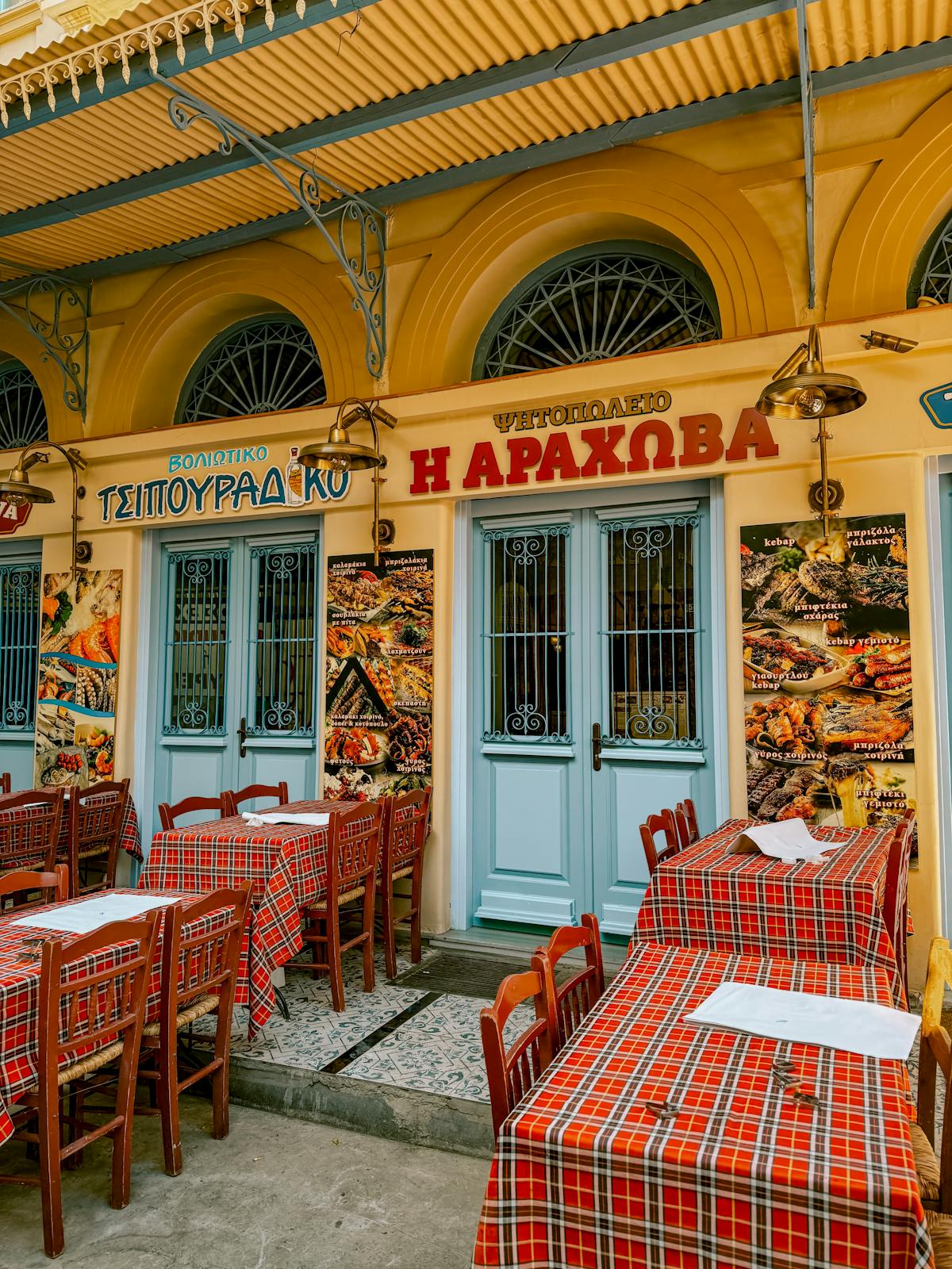 Outdoor dining at a traditional Athens taverna restaurant