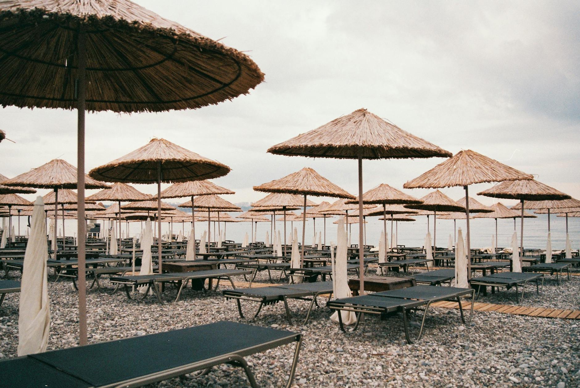 Organized beach club with sunbeds and umbrellas on the Athens Riviera