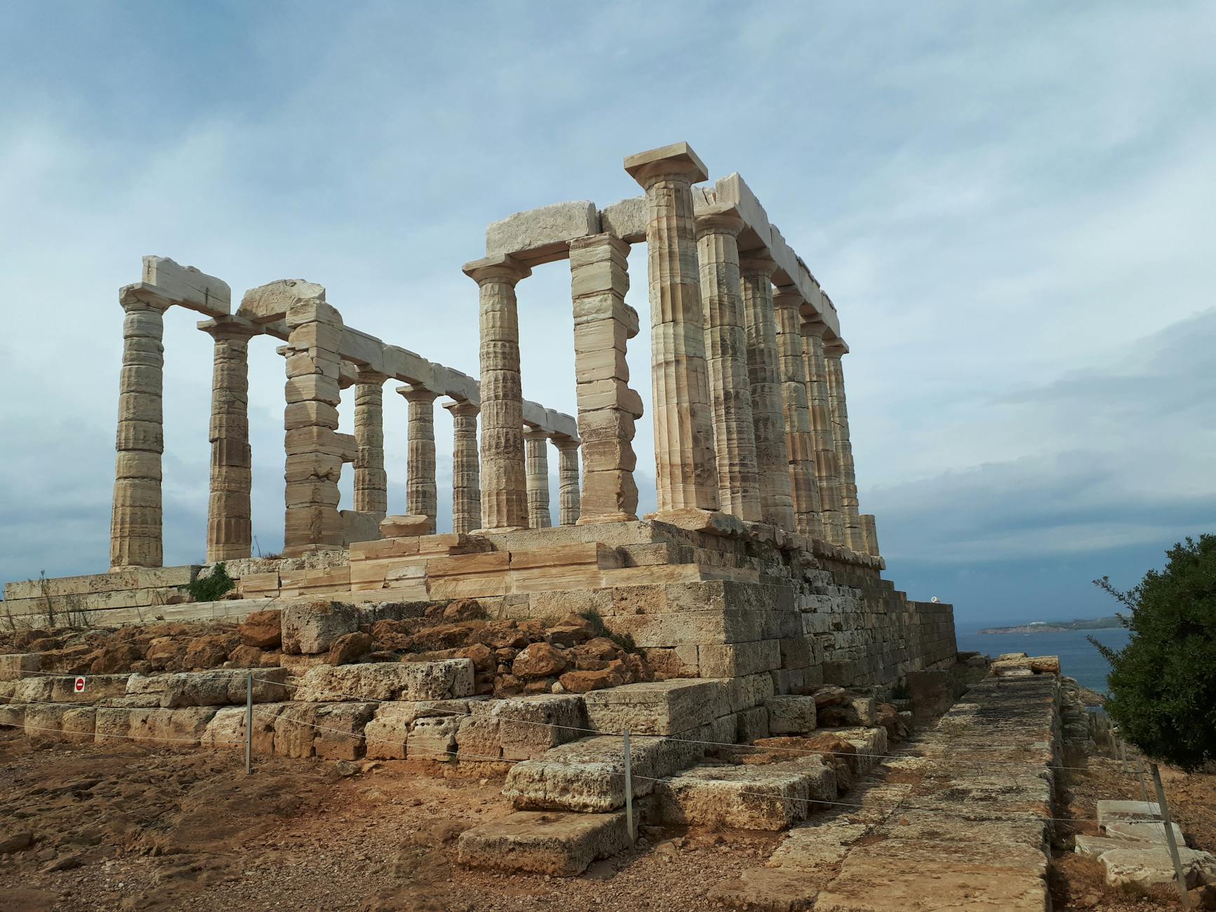Temple of Poseidon at Cape Sounion with dramatic sea views south of Athens