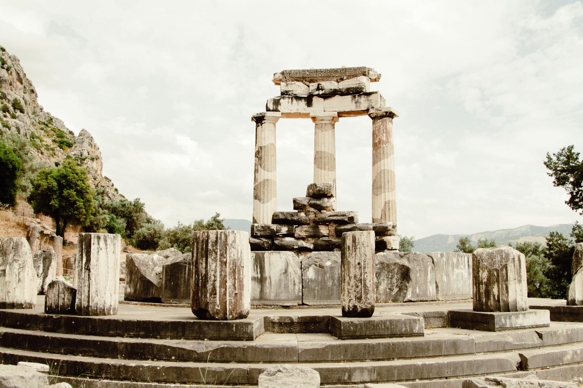The iconic Tholos circular temple ruins at the sanctuary of Athena Pronaia in Delphi Greece
