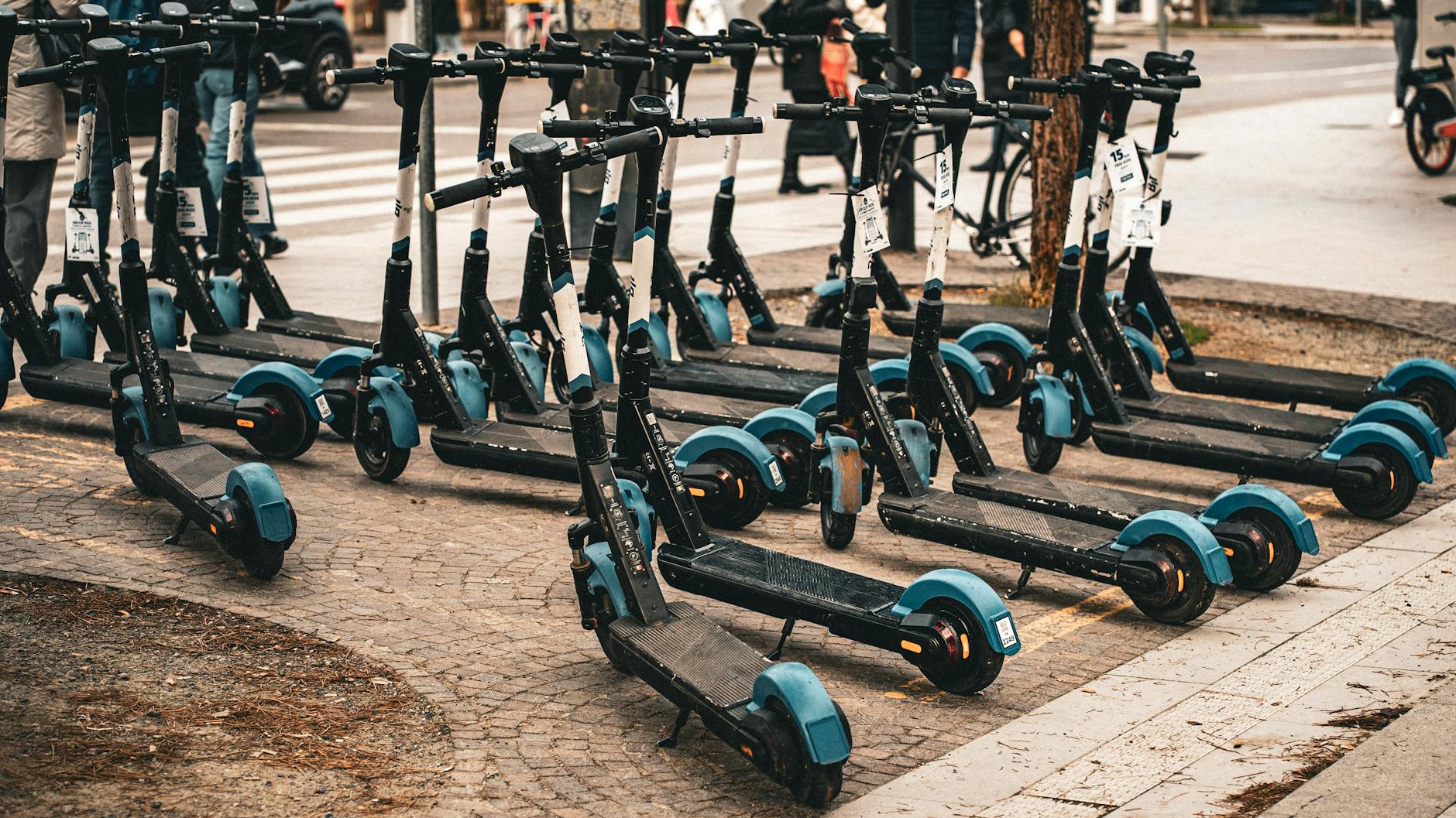 Electric scooter parked on a European city street offering eco-friendly urban transportation