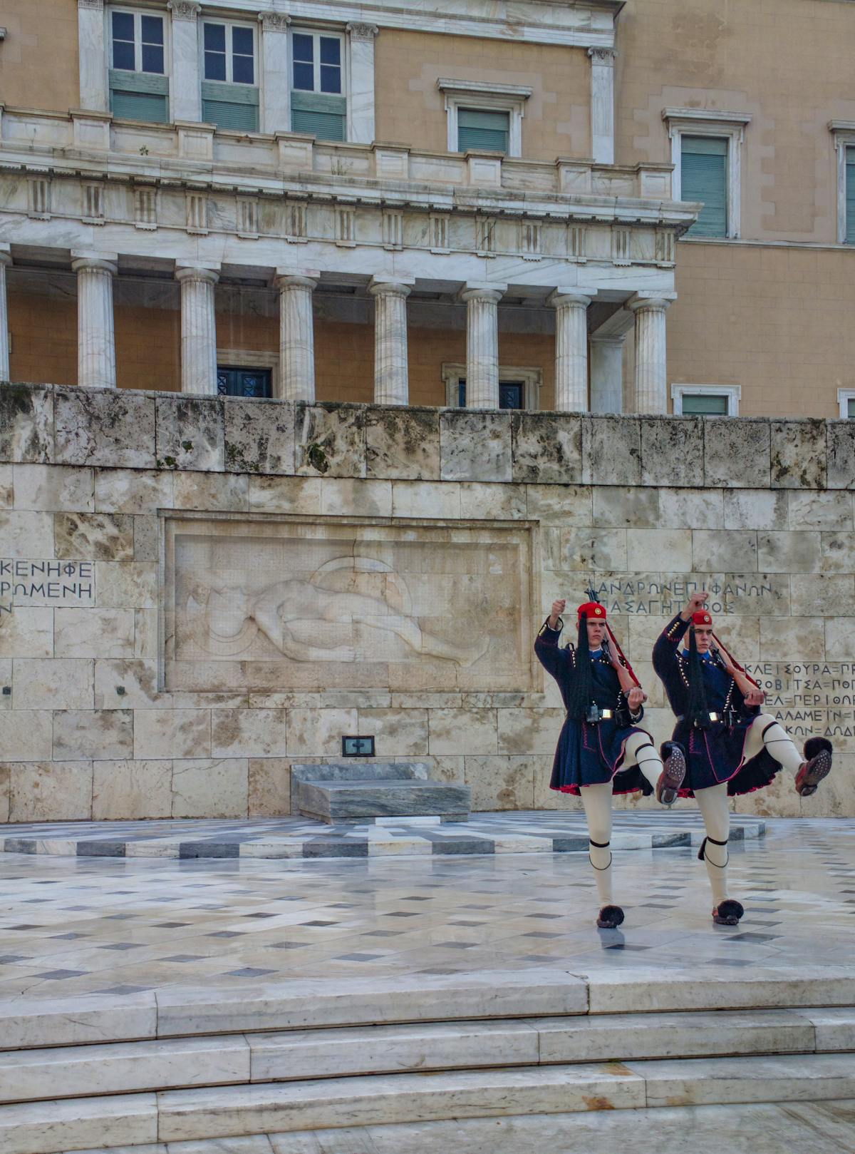 Evzones guards performing the ceremonial change of guard at the Greek Parliament Athens