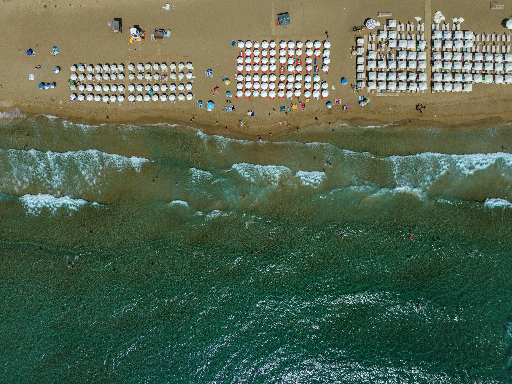 Glyfada Beach near Athens Greece with golden sand and clear blue water