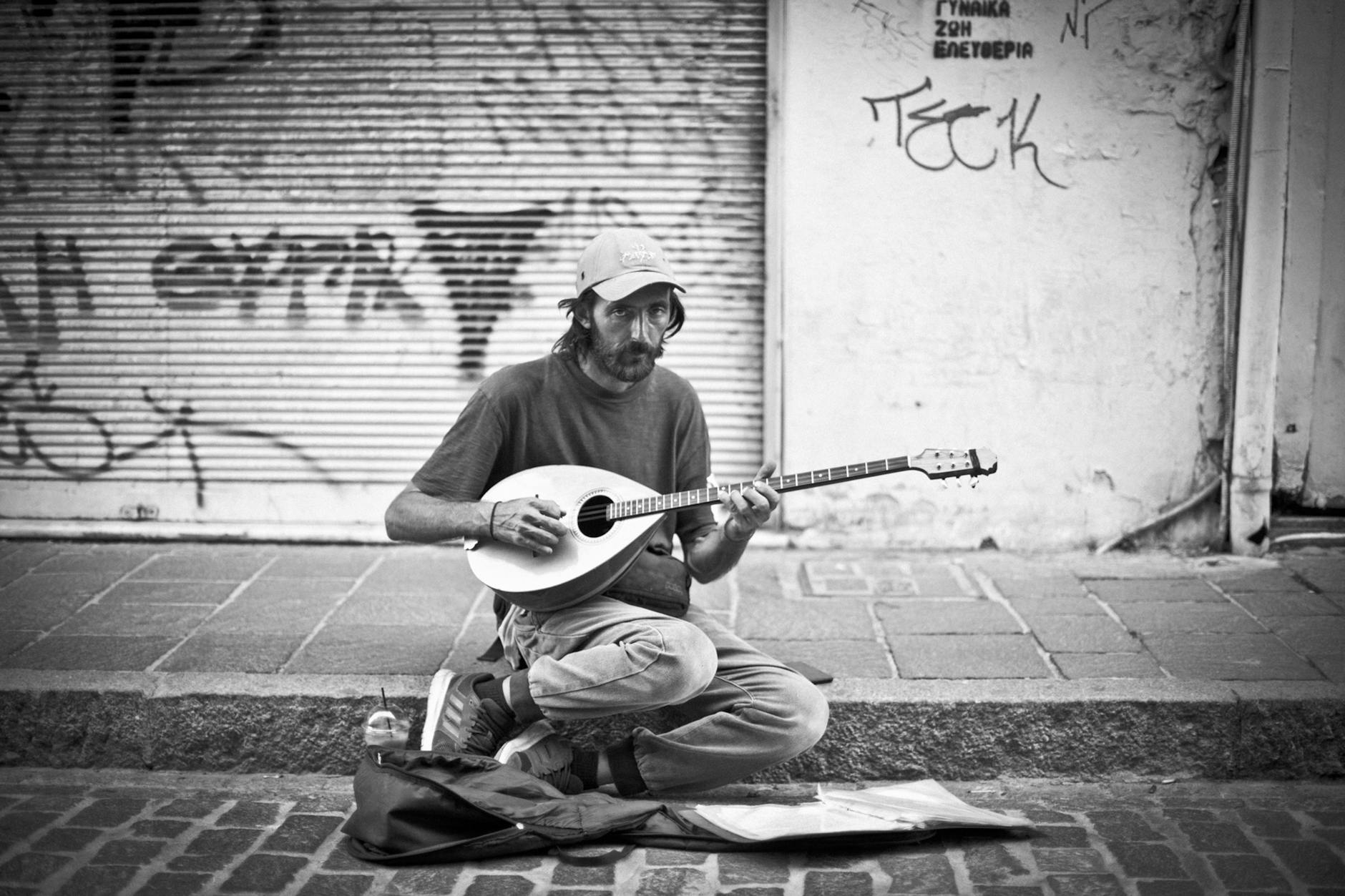 Live Greek bouzouki music performance at a traditional Athens venue