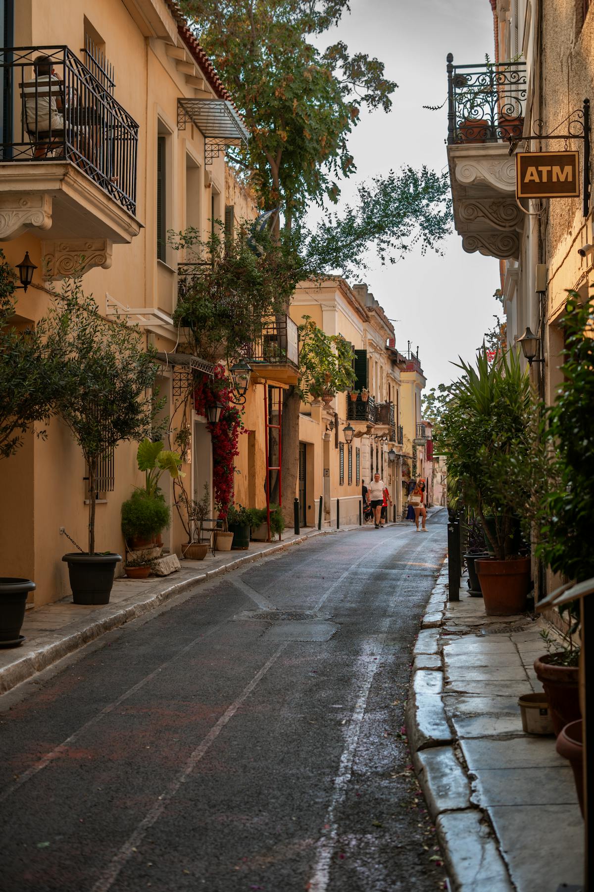 Charming cobblestone street in Plaka neighborhood Athens Greece