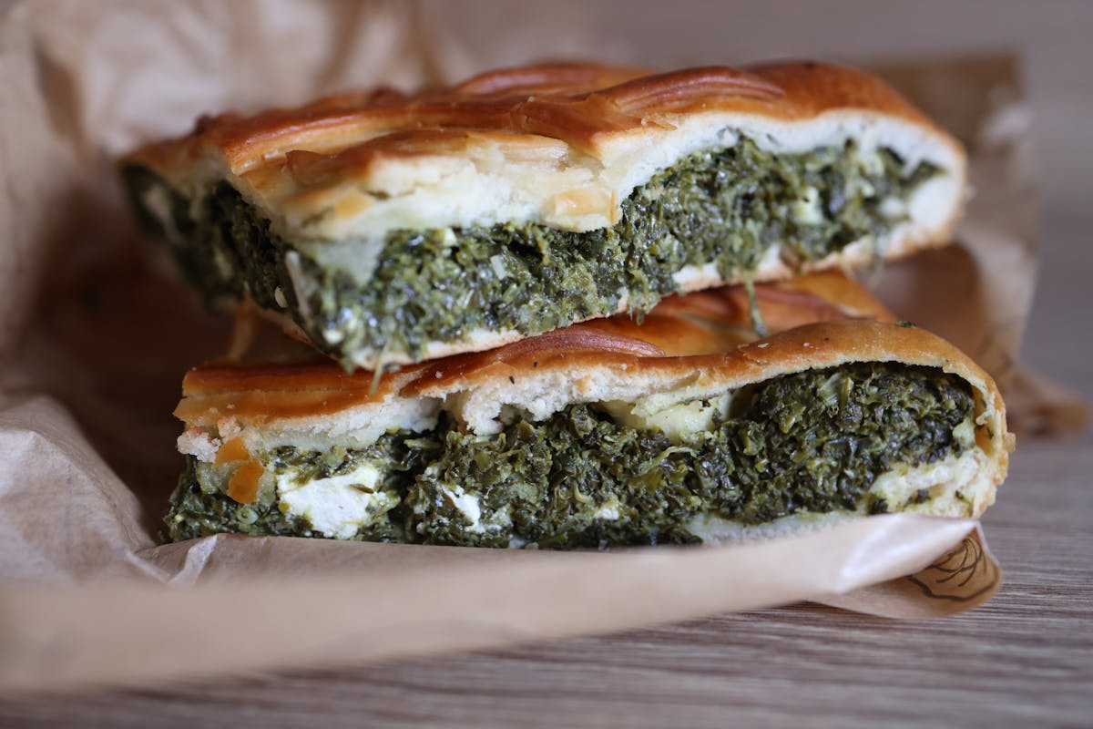 Fresh spanakopita Greek spinach and feta pie slices