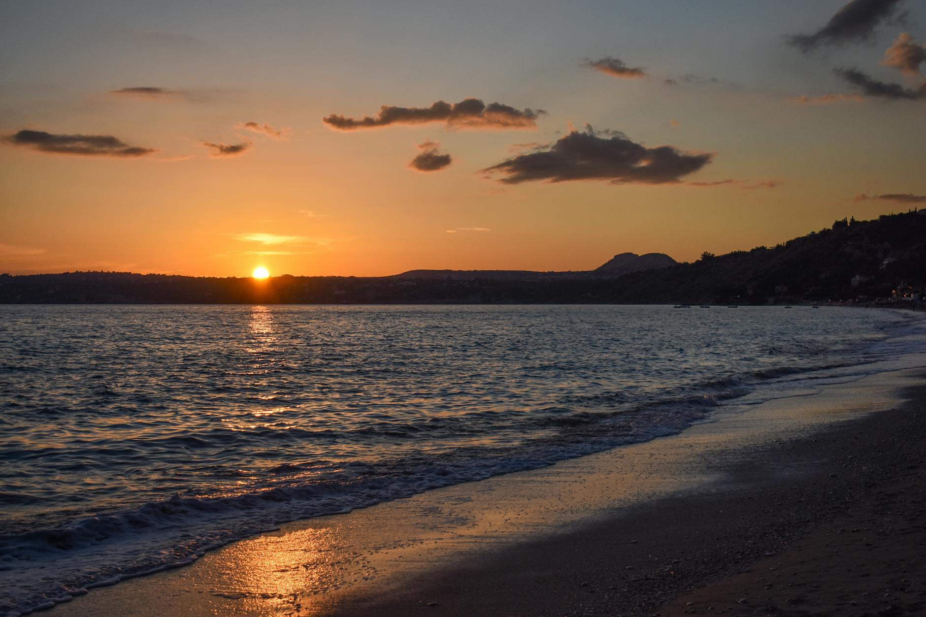 Stunning sunset over a beach on the Athens Riviera coastline