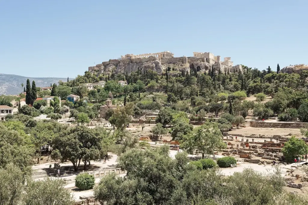 The Acropolis above the trees and ruins of the Ancient Agora, the two sites that shape how many days in Athens a first visit needs