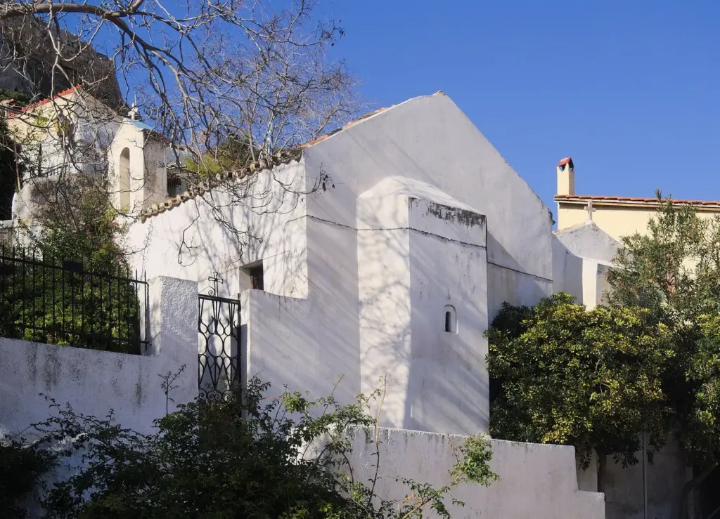 The whitewashed church of Agios Georgios tou Vrachou in Anafiotika, on the slope below the Acropolis