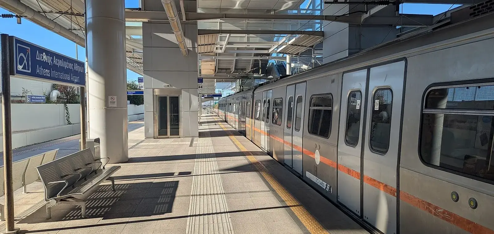 Line 3 metro train at Athens International Airport station, where the Athens metro ticket price rises to €9