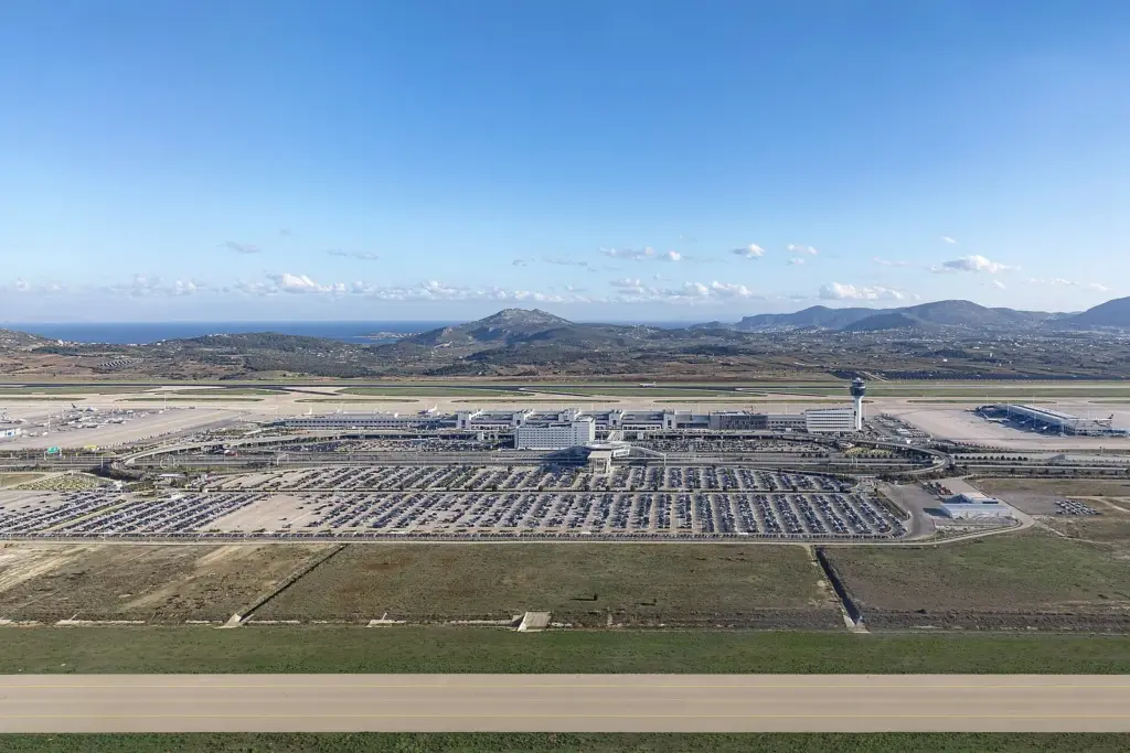 Athens International Airport terminal with its aprons and car parks seen from above