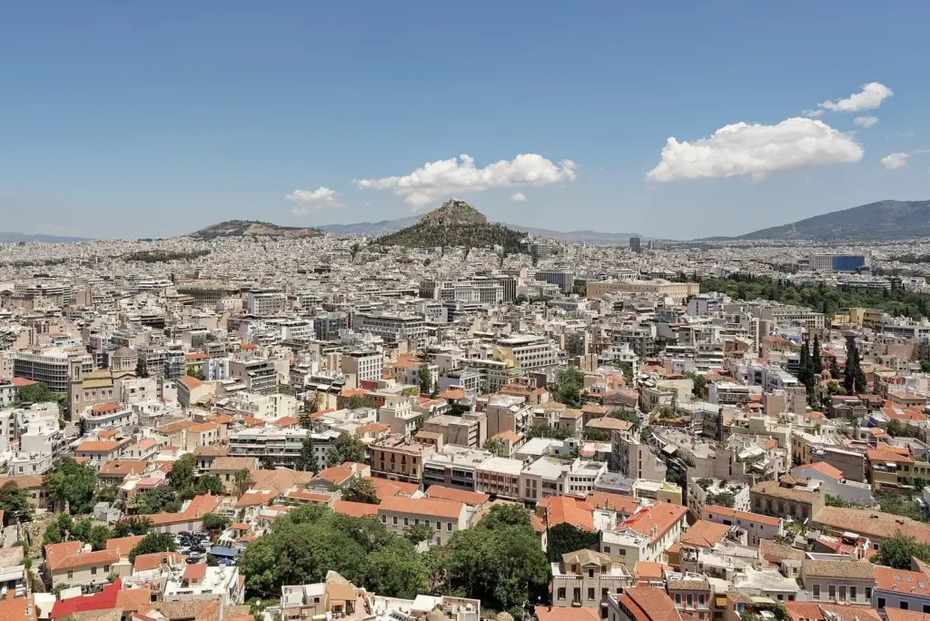 Lycabettus Hill rising above the rooftops of central Athens, seen from the Acropolis