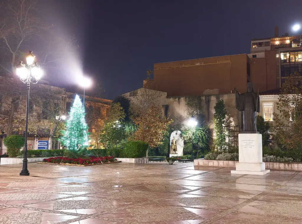 Christmas tree and lights in Mitropoleos Square beside the Athens cathedral at night