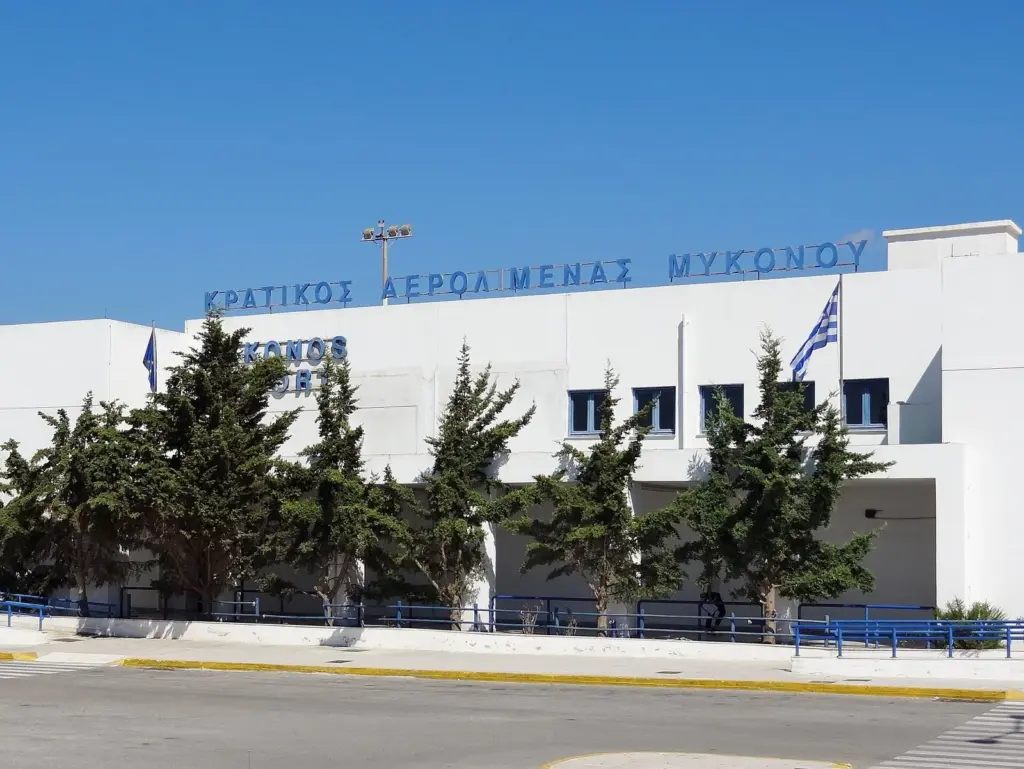 Terminal building at Mykonos airport with its Greek name above the entrance