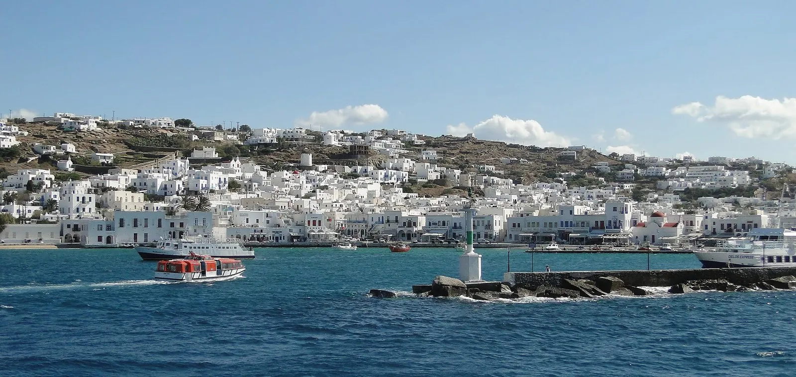 Mykonos Chora spread along the shore behind the old port breakwater