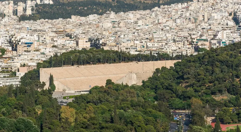 The marble Panathenaic Stadium in its wooded hollow in Pangrati