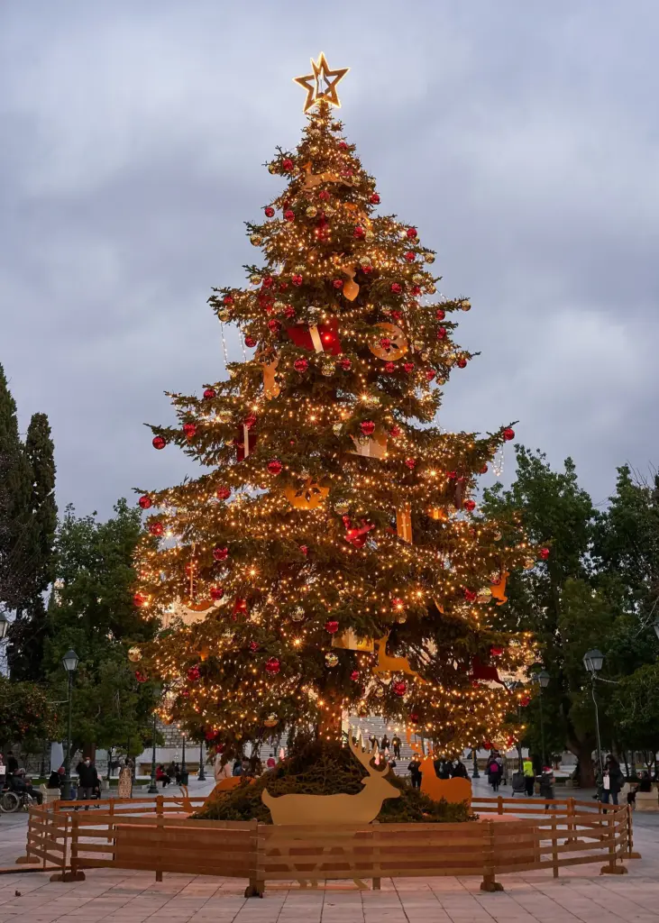 Christmas in Athens in December: the lit Christmas tree in Syntagma Square at dusk