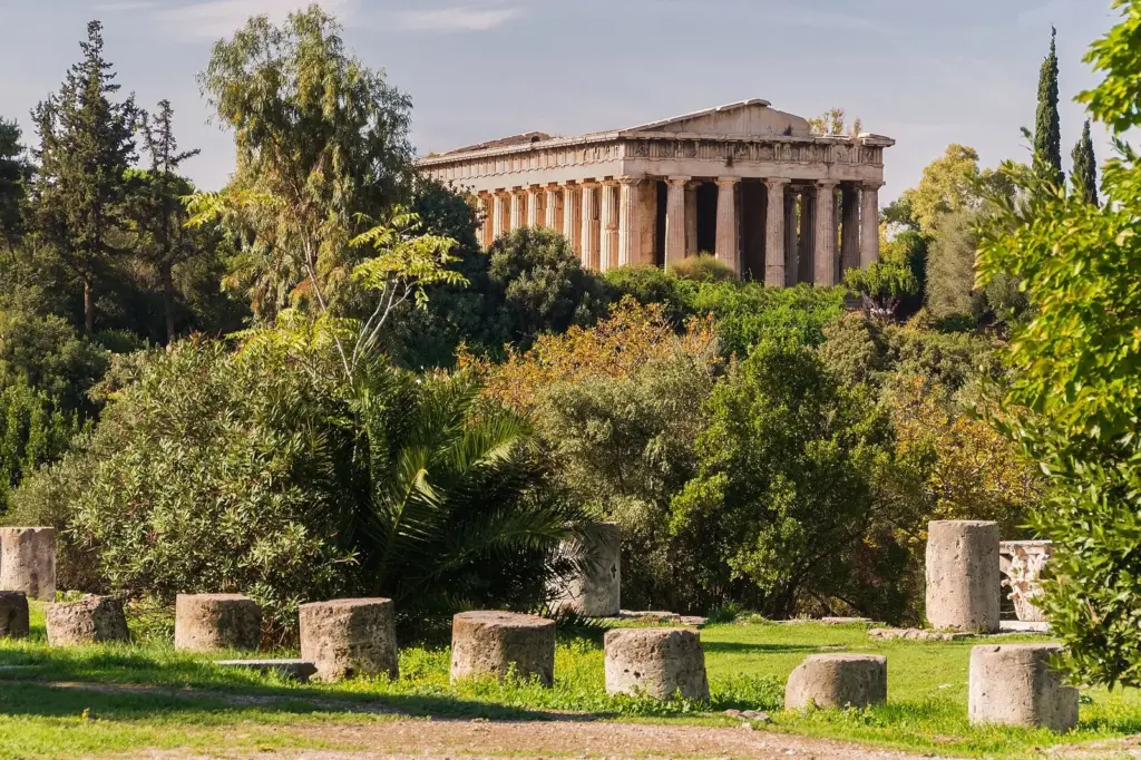 Temple of Hephaestus behind rows of column drums in the Ancient Agora of Athens