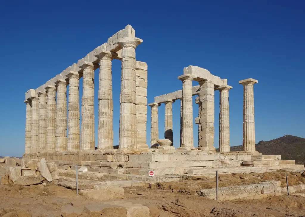 Doric columns of the Temple of Poseidon at Cape Sounion under a clear sky